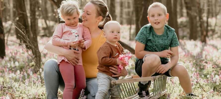family in woods