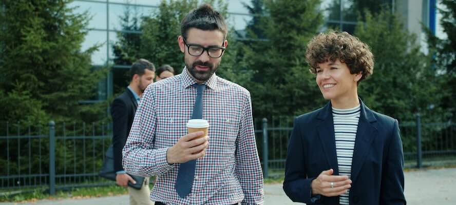 two work colleagues walking