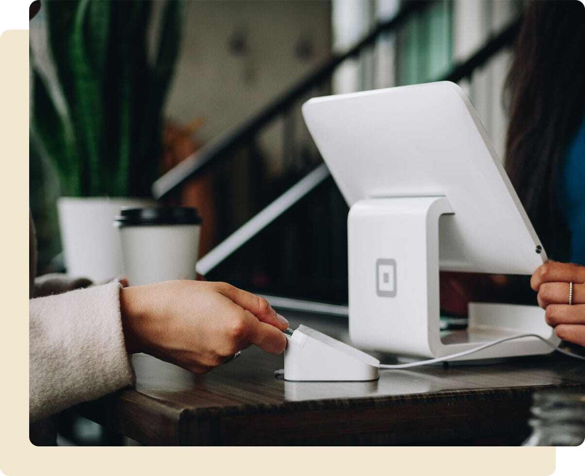 Someone using there credit card in the shops