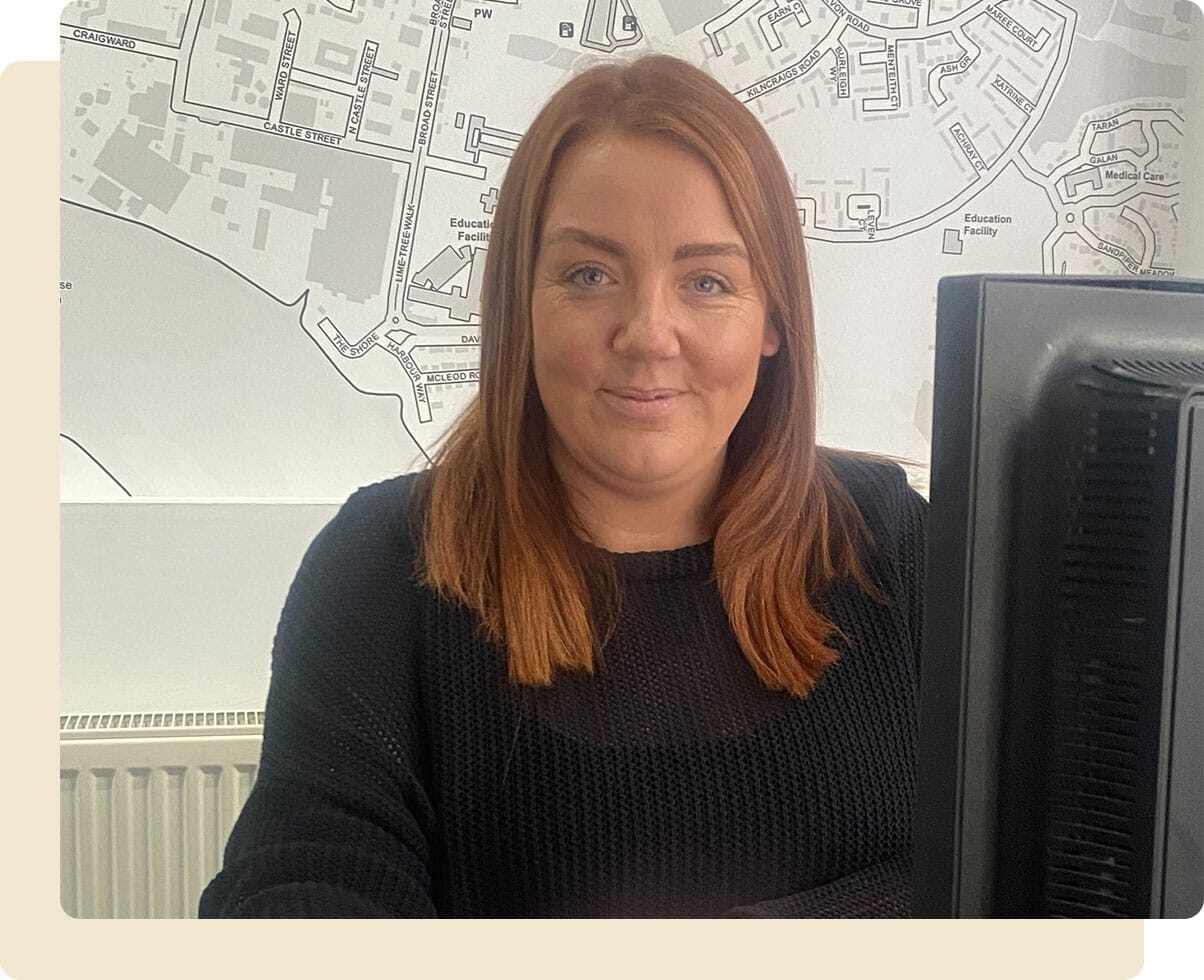 Stacey Stevenson in the office on the computer